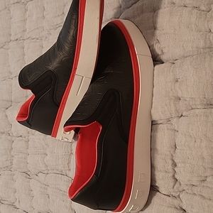 10 Salvatore Ferragamo black slip ons